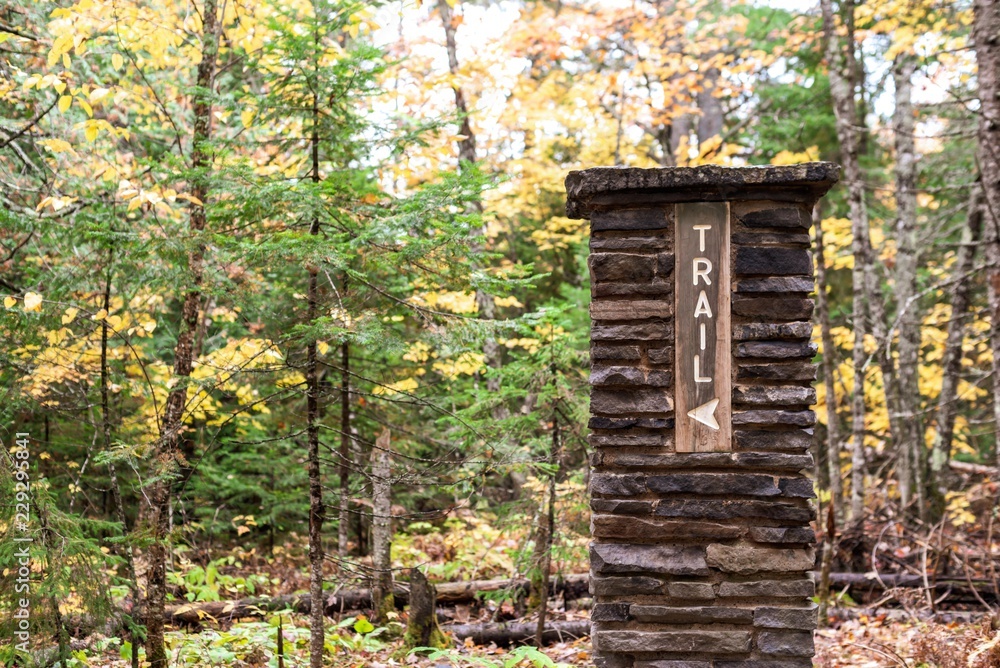 trailhead sign along the North County Trail or NCT in Upper Peninsula Michigan in Autumn trailhead sign along the North County Trail or NCT in Upper Peninsula Michigan in Autumn