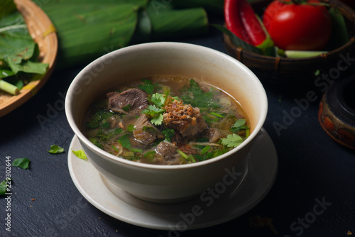 sup tulang or bone soup, popular traditional malay dish photo