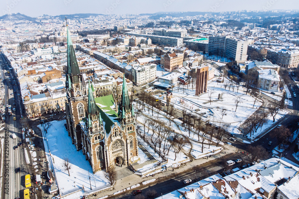 bird's eye view on old european church in winter day