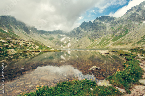Picturesque lake with crystal clear water in High Tatras Slovakia