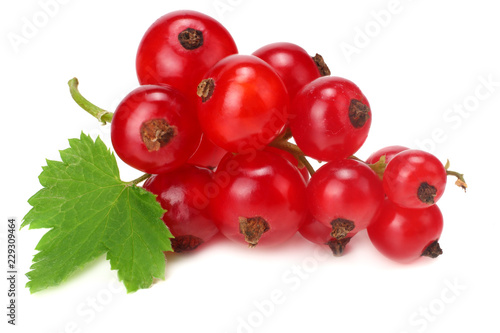 red currant with green leaf isolated on a white background. macro. healthy food