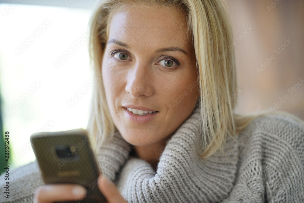 Portrait of blond woman with turtleneck pullover Portrait of blond woman with turtleneck pullover