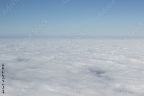 aerial shoot sky clouds from above, horizon lane, empty space for copy or text