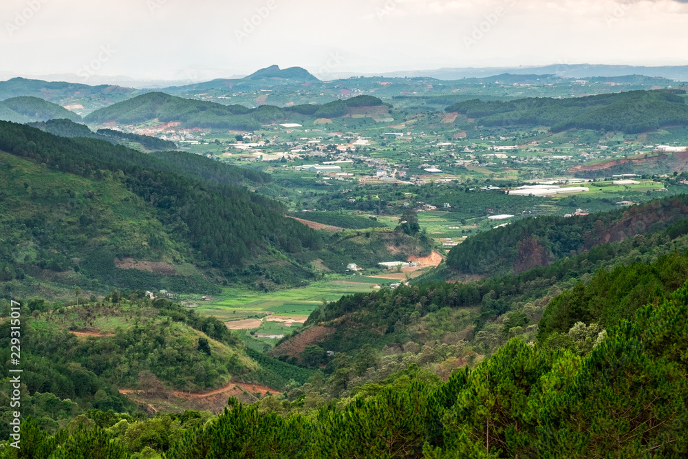 Panoramic view of mountains and valleys in Dalat, Vietnam. Da lat is one of the best tourism cities and aslo one of the largest vegetable and flowers growing areas in Vietnam