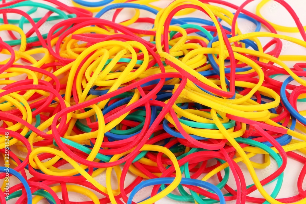 close up of a heap from colorful elasic bands in the studio close up of a heap from colorful elasic bands in the studio
