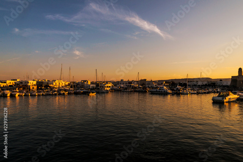Sunset in Villanova port harbour Marina Ostuni on the Adriatic sea