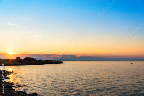 Sunset in Villanova port harbour Marina Ostuni on the Adriatic sea