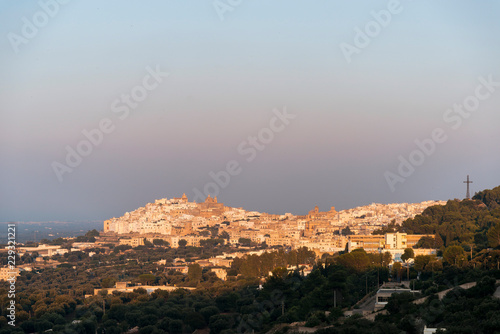Panoramic view of the medieval white village of Ostuni at sunset © Sergio Pazzano