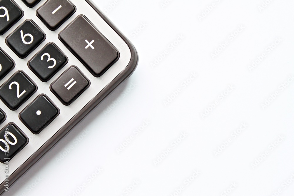 Business, finance, savings money, investment, taxes or accounting concept : Top view or flat lay of calculator on white background with copy space ready for adding or mock up Business, finance, savings money, investment, taxes or accounting concept : Top view or flat lay of calculator on white background with copy space ready for adding or mock up