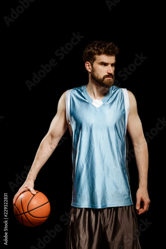 Basketball player holding a ball