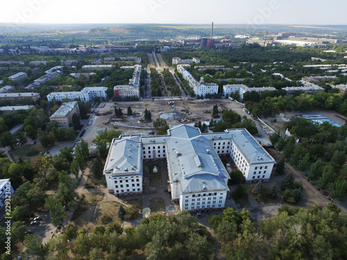 Aerial view of on reconstruction of the fountain and central square of the city and Palace of Culture of Kramatorsk - the administrative center not occupied part of Donetsk region. photo