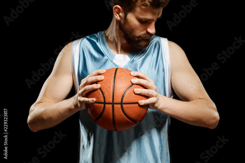 Basketball player holding a ball