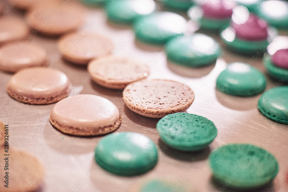 macaroons shells in a tray. Process of making macaron, french dessert, macaroons shells in a tray. Process of making macaron, french dessert,