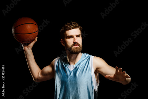 Man improving basketball shooting skills © yuriygolub