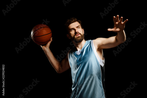 Sportsman throws a basketball © yuriygolub