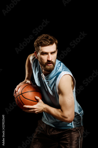 Basketball player drives to basket © yuriygolub
