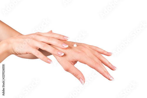 Woman applying cream  female hands  white background  closeup