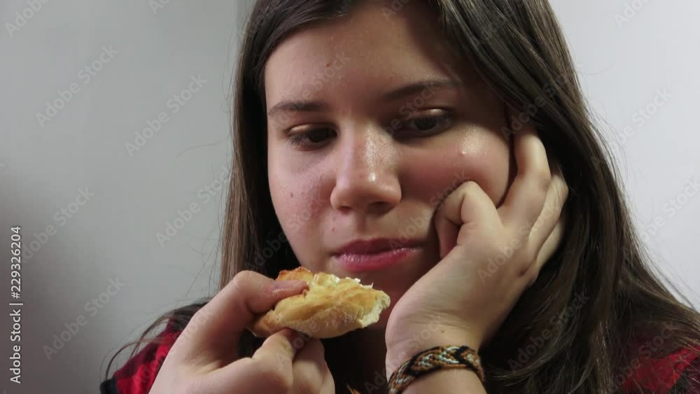 The charming girl serves a large pizza alone The charming girl serves a large pizza alone