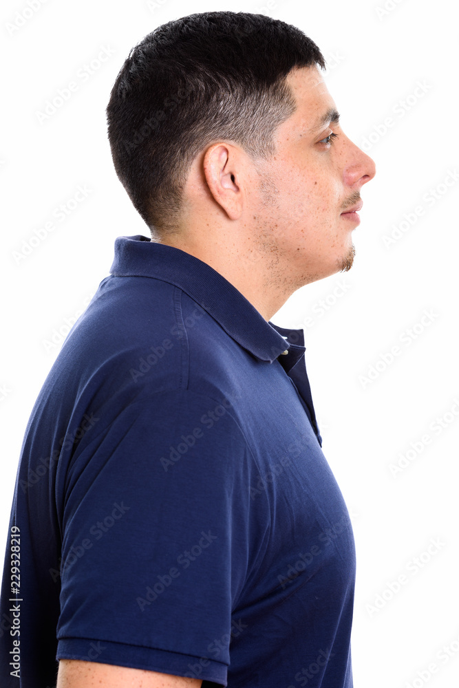 Profile view portrait of young Hispanic man Profile view portrait of young Hispanic man