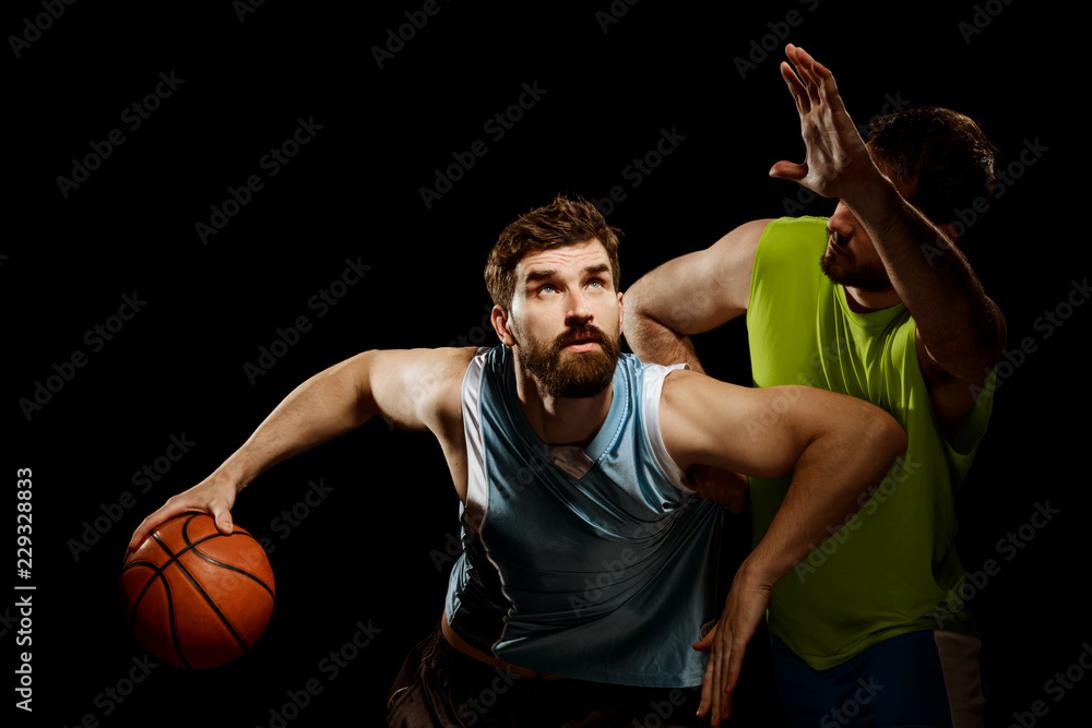Player dribbling towards the basket