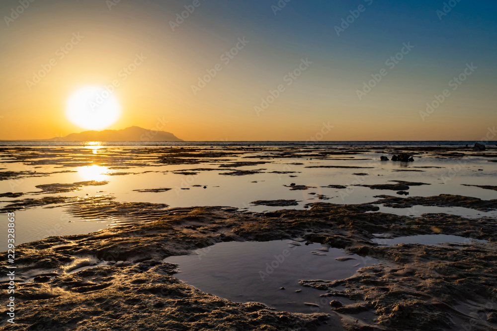 Obraz premium Wonderful sunset in Sharm-El-Sheikh, Egypt over Tiran island, Red sea, Saudi Arabia