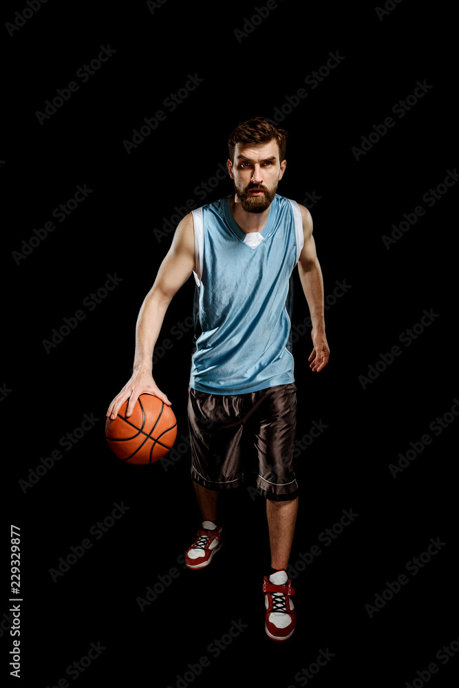Basketball player holding a ball Basketball player holding a ball