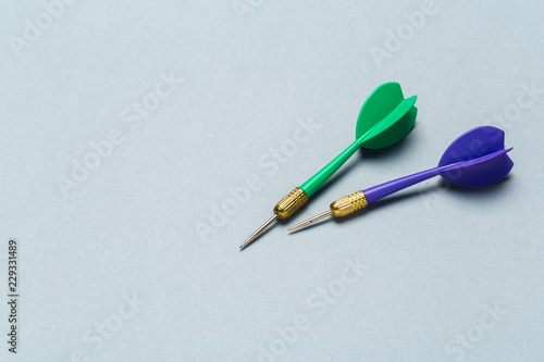 Blue and Green Darts arrows on light gray background