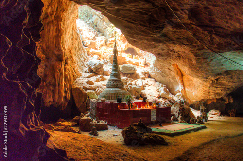 Religious statues in the Sadan cave near Hpa-An in Myanmar
 photo