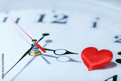 Time for love. The concept of the time of love, the time of date, the wedding, the day of St. Valentine. photo