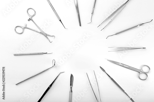 Dentist's tools on white background
