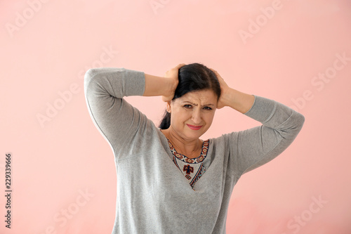 Portrait of mature woman su...
