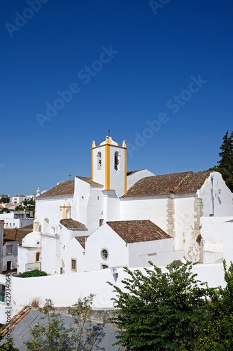 Elevated view of Santiago church in the old town (Igreja de Santiago), Tavira, Algarve, Portugal.