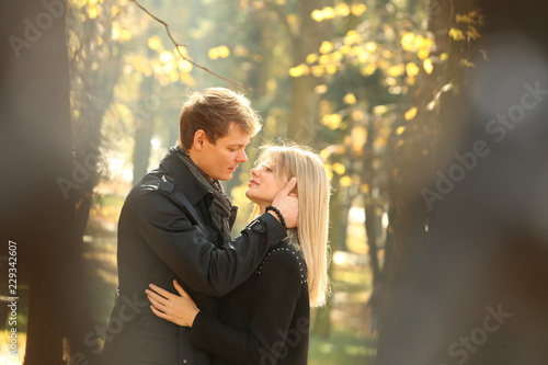 couple people young man and women walking autumn park fanny sunny day