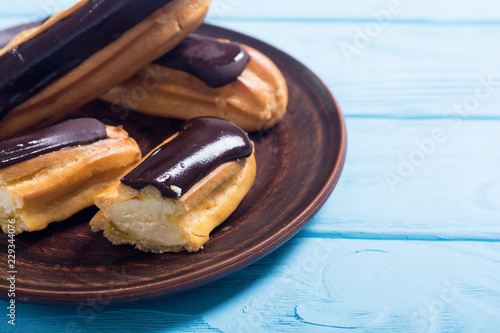 French dessert eclair with chocolate .