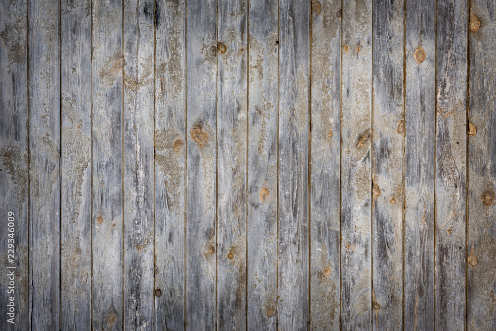Eine Holzwand mit leichter Vignette als Hintergrund Eine Holzwand mit leichter Vignette als Hintergrund