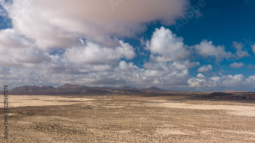 aerial view of desert and volcanic mountains