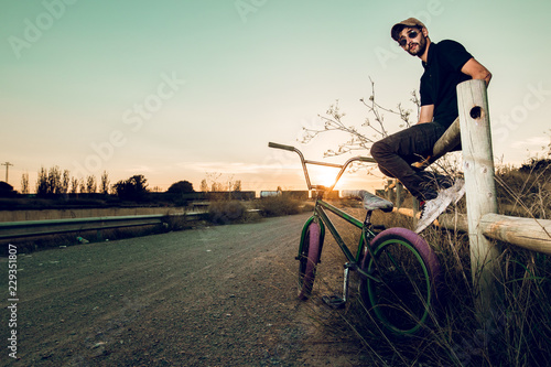 Young man with his bmx bike.BMX rider