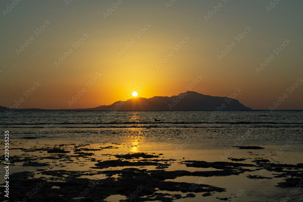 Wonderful sunrise over Red sea and Tiran island