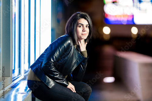 Young beautiful woman in evening night city © B@rmaley