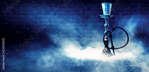 Hookah smoking on a dark co...
