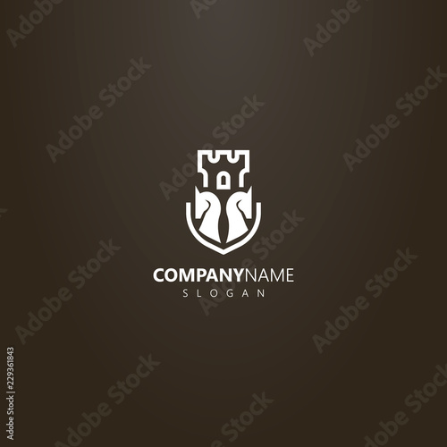 white logo on a black background. simple vector flat art logo of two chess knights and castle tower behind them