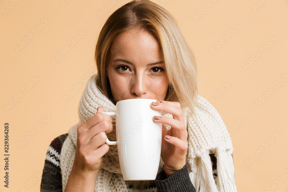 Close up portrait of a happy girl dressed in sweater Close up portrait of a happy girl dressed in sweater