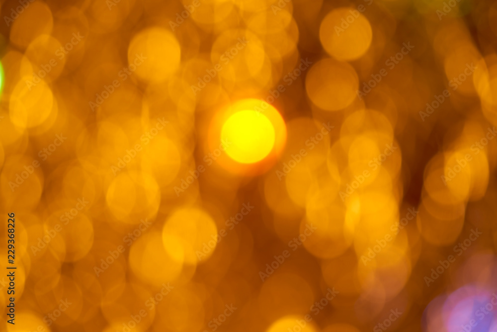 Fototapeta premium Golden flare lights blur background