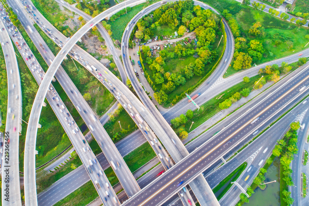 Aerial view of city transport junction road with vehicle