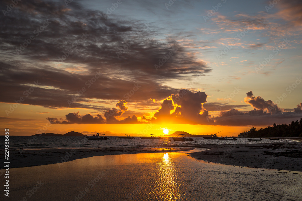 Colourful sunset in in Praslin island in Seychelles