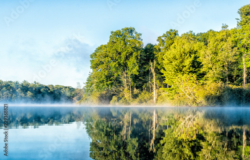 Tranquil misty lake photo
