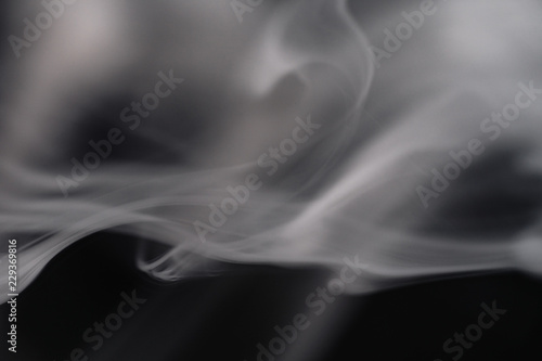Cigarette Smoke On Black Background Detailed Close-Up