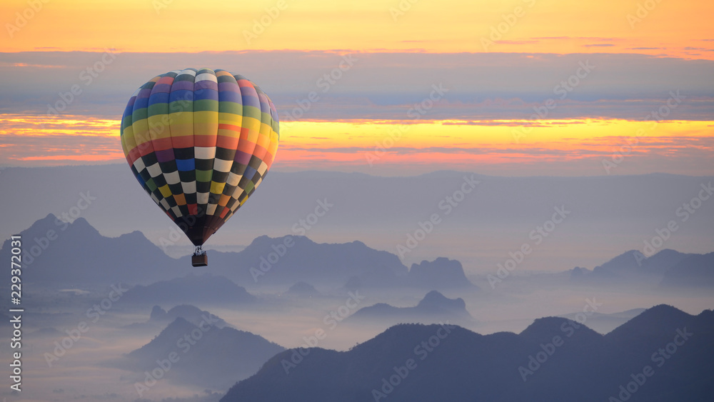 Hot air balloon over the sea of mist.