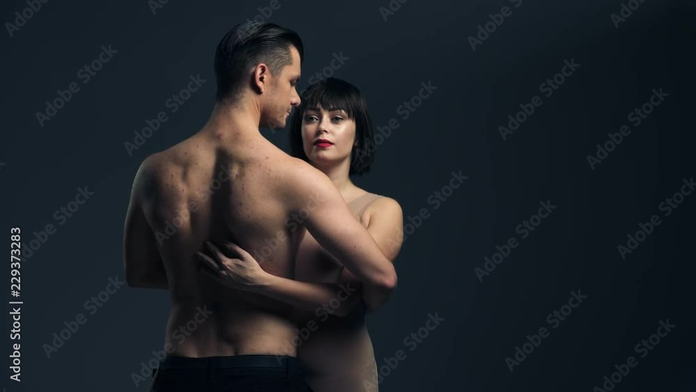 Girlfriend and boyfriend embrace one another Girlfriend and boyfriend embrace one another