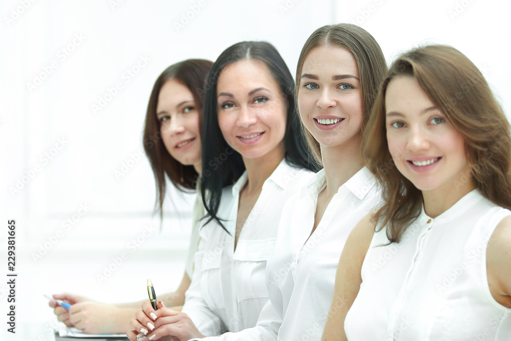 successful business team sitting at the Desk.photo with copy space successful business team sitting at the Desk.photo with copy space